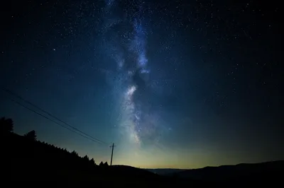 Milky Way Above Evergreen Hillside