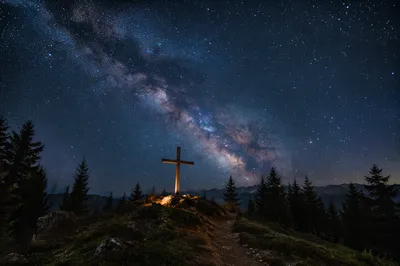 Wooden Cross Beneath Milky Way Pines