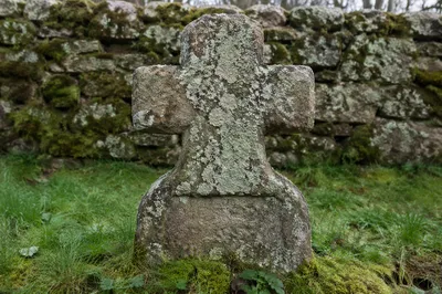 Weathered Stone Cross in Historic Cemetery