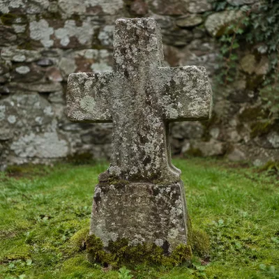 Weathered Stone Cross in Historic Cemetery
