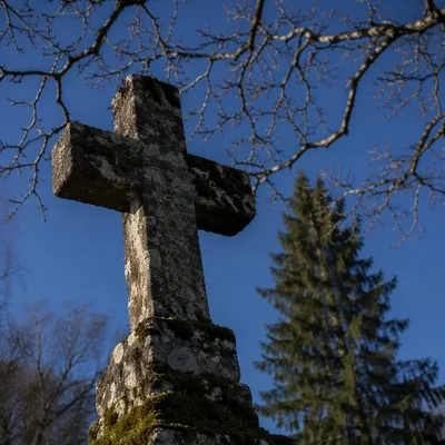 Weathered Stone Cross in Evergreen Cemetery