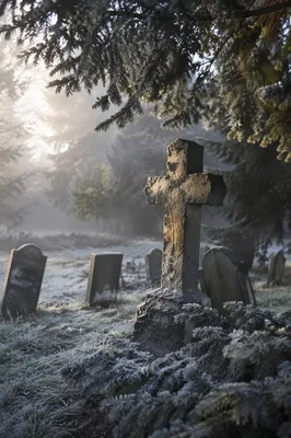 Weathered Stone Cross at Winter Dawn