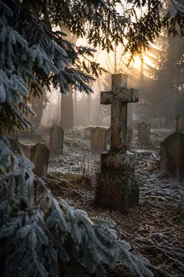 Weathered Stone Cross at Winter Dawn