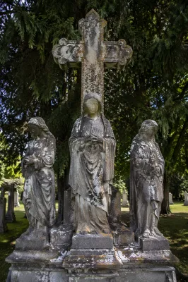 Weathered Stone Cross in Evergreen Cemetery