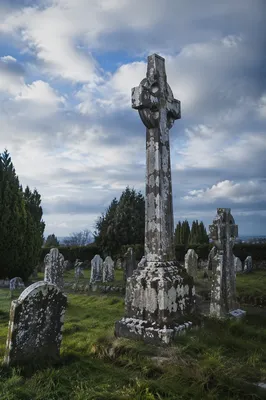 Weathered Stone Cross in Evergreen Cemetery
