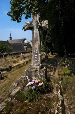 Weathered Stone Cross in Evergreen Cemetery