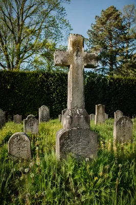 Weathered Stone Cross in Evergreen Cemetery