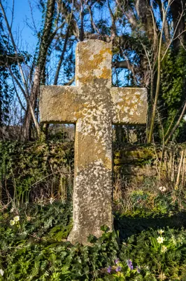 Weathered Stone Cross in Evergreen Cemetery