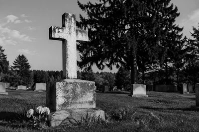 Weathered Stone Cross in Evergreen Cemetery