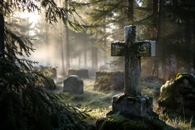 Weathered Stone Cross in Evergreen Cemetery