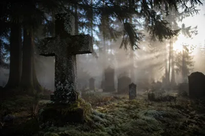 Weathered Stone Cross in Evergreen Cemetery