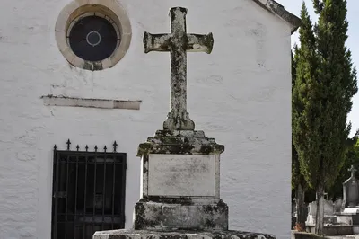 Weathered Stone Cross in Old Cemetery