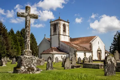 Weathered Stone Cross by Historic Church