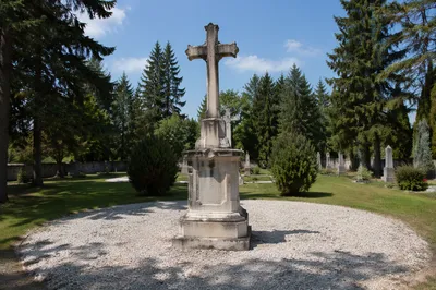 Weathered Stone Cross in Evergreen Cemetery