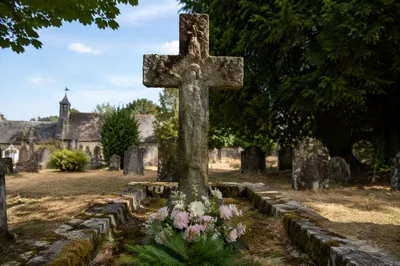 Weathered Stone Cross in Evergreen Cemetery