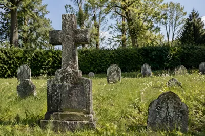 Weathered Stone Cross in Evergreen Cemetery