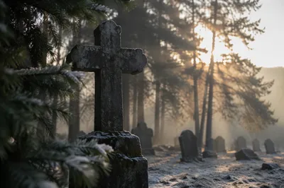 Weathered Stone Cross in Evergreen Cemetery
