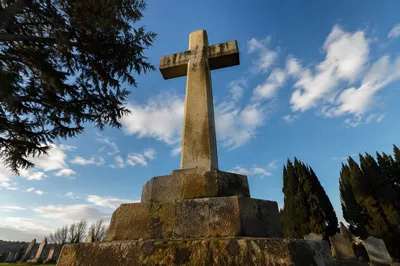 Weathered Stone Cross in Evergreen Cemetery