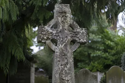 Weathered Stone Cross in Evergreen Cemetery