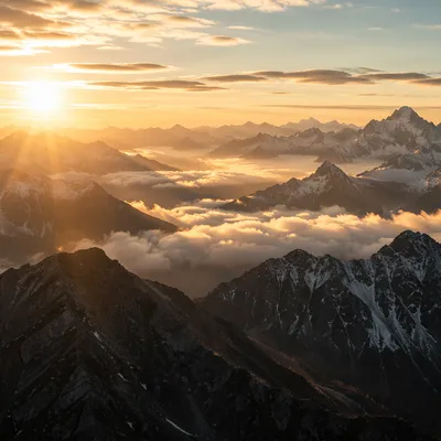 Golden Sunrise Over Evergreen Alpine Peaks