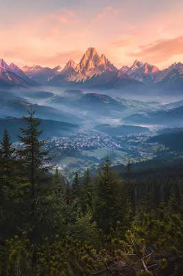 Golden Sunrise Over Evergreen Mountain Valley