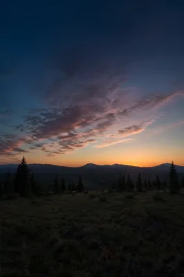 Golden Dawn Over Evergreen Mountain Highlands