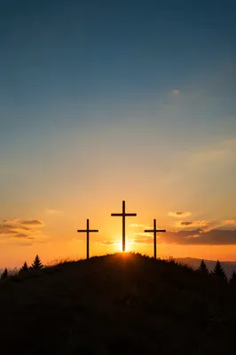 Three Crosses on Sunset Evergreen Hill