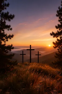 Three Crosses on Hill at Sunset