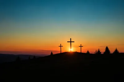 Three Crosses at Sunset on Grassy Hill