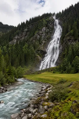 Evergreen Valley Waterfall With Glacial River