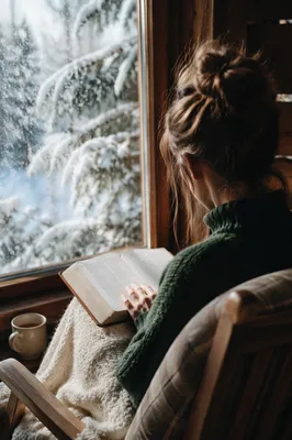 Woman Reading Bible Beside Winter Window
