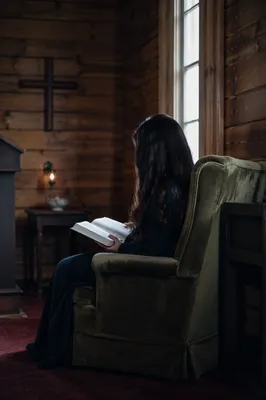 Woman Reading Bible by Chapel Window
