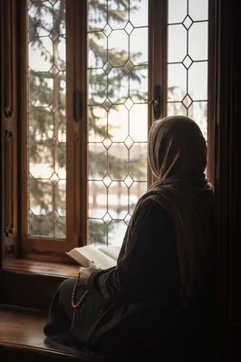 Contemplative Woman Reading Bible by Window