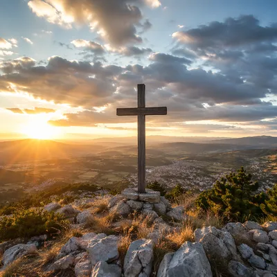 Wooden Cross on Hilltop at Sunset