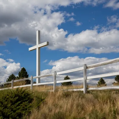 White Wooden Cross on Hilltop Sky