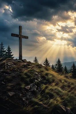 Weathered Cross on Hilltop Under Dramatic Sky