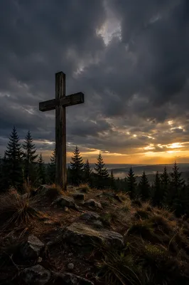Weathered Cross on Evergreen Hilltop at Sunset