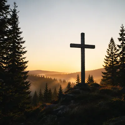 Wooden Cross Silhouette on Evergreen Sunrise Ridge