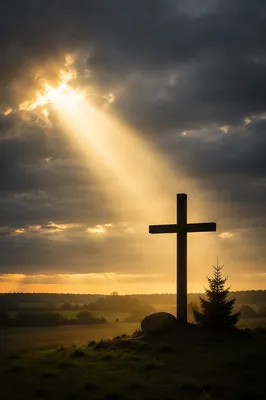Wooden Cross Silhouette at Hopeful Sunrise