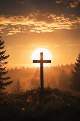 Wooden Cross Silhouette at Golden Sunrise