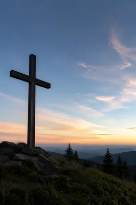 Wooden Cross Silhouette at Evergreen Sunrise