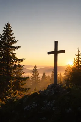 Wooden Cross Silhouette on Evergreen Sunrise Ridge