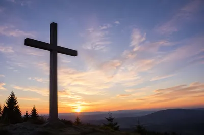 Wooden Cross Silhouette at Evergreen Sunrise