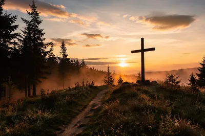 Wooden Cross Silhouette at Evergreen Sunrise