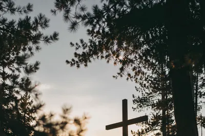 Wooden Cross at Evergreen Sunrise