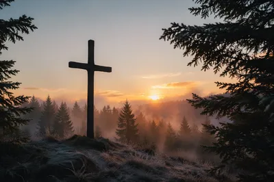 Wooden Cross Silhouette at Evergreen Sunrise