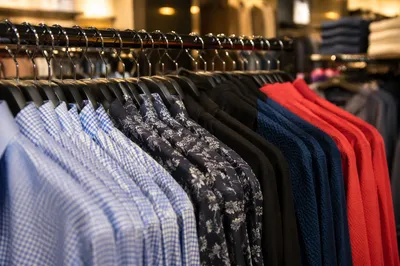Boutique Clothing Rack With Patterned Shirts