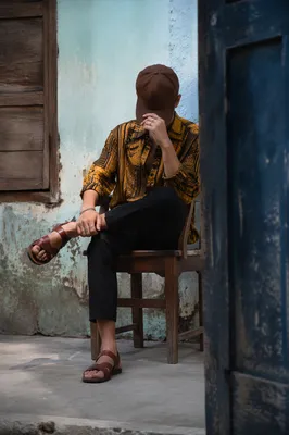 Anonymous Street Style Portrait in Rustic Courtyard