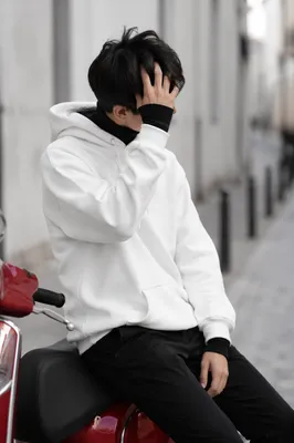 Urban Street Style Model on Red Scooter