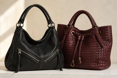 Luxury Leather Handbags on Cream Tabletop
